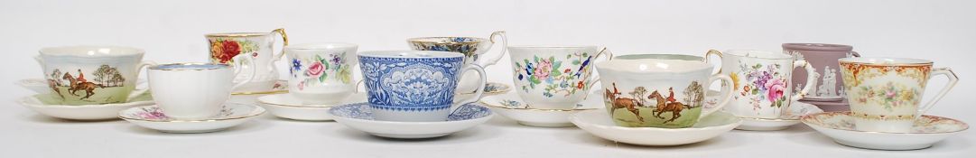A large collection of tea cups and saucers to include examples by Royal Doulton '  A Hunt Scene ',