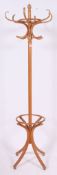 A vintage pine hatstand, in the style of Thonet, with shaped top.