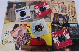 A collection of Long Play ( LP ) and 45 rpm singles / EP vinyl records to include RAy Charles,