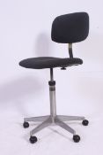 A 1970's retro stainless steel typists Industrial swivel chair with padded seat and back rests.
