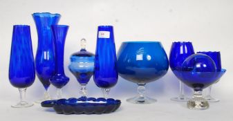 A good collection of Bristol Blue style glass to include vases, dishes,