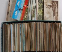 A box containing approx 600 postcards dating to the early to mid 20th century