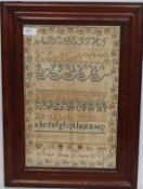 A Victorian needlework sampler, by Anna Jane Beare, dated 1862. Framed.