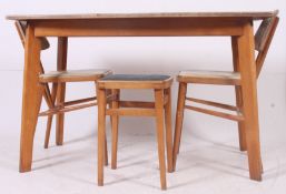 A 1950's retro  large yellow and fleck formica kitchen diner - dining table raised on tapered