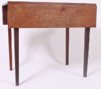 A 19th century Georgian mahogany drop leaf pembroke table raised on squared legs.