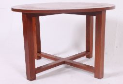 A 1970's retro teak wood circular coffee table,