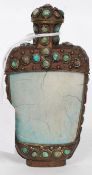 A 19th century Sino-Tibetan snuff bottle having stone tapering body with metal mounts inset with