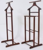 A pair of mid 20th century ladies and gentlemans mahogany vanity stands,