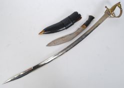 A 20th century vintage Indian hanging decorative sword,