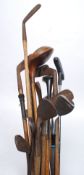 A collection of various golf clubs to include Forgan, Special,