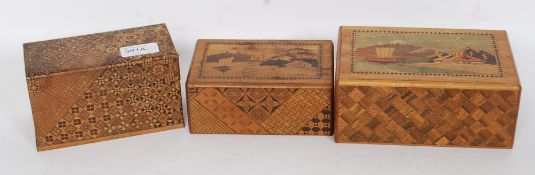 2 Japanese marquetry wooden puzzle boxes  together with a small 2 drawer trinket box