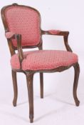 A French Fauteuil armchair, 20th century having contemporary upholstered seat and back rest.