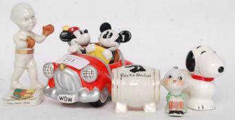 A collection of ceramics to include a Felix The Cat, Snoopy, Micky and Minnie cruet set,