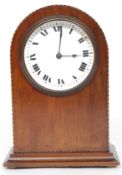 An  edWARDIAN mahogany dome mantle clock, having string inlay border,