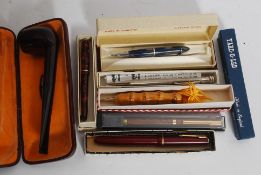 A collection of vintage pens and mechanical pencils to include Parker 14k nib,
