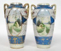 A pair of 20th Century Kinjo china hand painted twin handled Nippon vases decorated with landscape