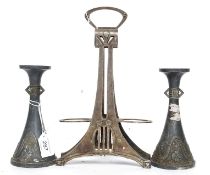 An early 20th century Art Nouveau silver plate cruet stand together with a pair of Art Nouveau