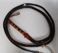 An extremely long  plaited / braided leather elephant whip