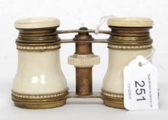 A pair of French 19th / 20th century opera glasses being finished in Ivory / bone.
