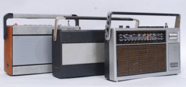 A collection of three retro and vintage radios to include a Roberts,