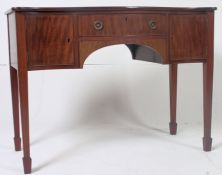 A Georgian style mahogany bow small proportion sideboard with drawers and serpentine front raised