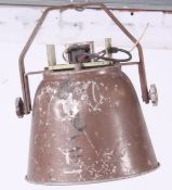 A vintage mid 20th century Industrial outside speaker with metal bracket.