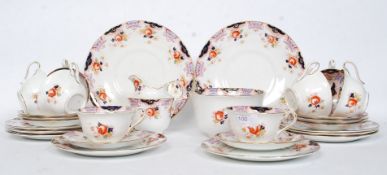 A good early 20th century Imari pattern tea service comprising cups saucers plates etc by Anchor