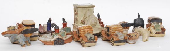 TREMAR; A collection of assorted vintage Tremar pottery figures, vehicles and ships.