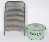 A collection of vintage kitchenalia to include an Enamel cake tin with decal to front along with a
