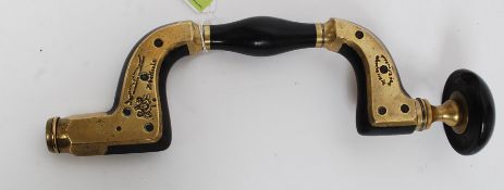 A 19th cenutry  unusual Ultimatum brass framed variegated ebony wood working brace by Wm Marples