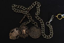 An early 20th century white metal albert chain with hallmarked silver bar and silver hallmarked