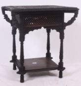 A late 19th century Anglo - Colonial Burmese carved side - occasional lamp table The table with