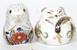 A Crown Derby ceramic figurine - Door mouse together with Poppy Mouse each with gold stoppers.