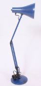 A blue Herbert Terry anglepoise light, in blue with shaped shade on sprung arm supports.