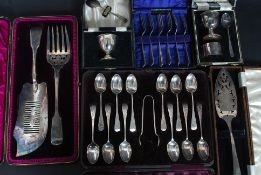 A collection of Edwardian and later cased flatwares to include christening set, dessert forks,