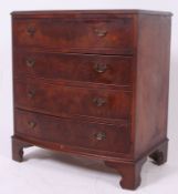 A god 20th century Georgian style mahogany bachelors bow front chest of drawers raised on bracket