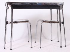 A retro 1970's Tavo dining table raised on chrome supports with extending table top along with 2