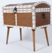 A retro 1960's unusual vinyl upholstered dome top treasure chest raused on  turned and tapered