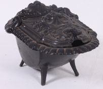 A 19th century French cast iron coal hod scuttle purdonium.