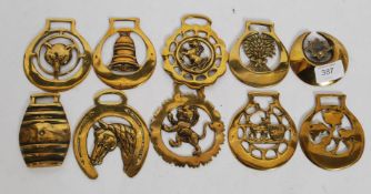 A collection of  20th century figural horse brasses, mostly cast.