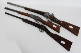 A vintage reproduction wall hanging Winchester rifle together with a vintage Diana breakneck air