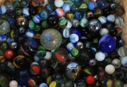A collection of vintage marbles to include many different designs and sizes