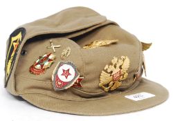 A Russian military cap with date numerals to the inside,