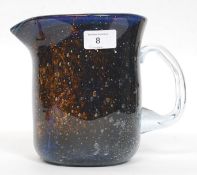 A Mdina style studio glass jug, with control bubble design with handle.