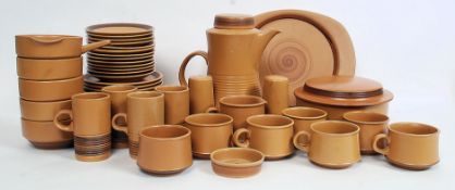 A large 20th century retro stoneware Denby style dinner service.