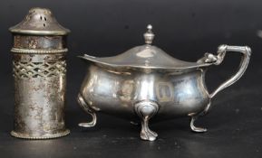 A silver hallmarked mustard pot along with a silver plate pepper pot / cruet 43g