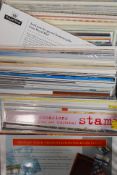 STAMPS: A large collection of unused stamp presentation packs, all unused decimal examples.