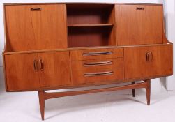 A good 1970's retro G-Plan teak wood sideboard - dresser raised on tapered legs with drawers and