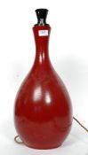 A large retro /  vintage 1970's laquered red wooden table lamp of large onion form.