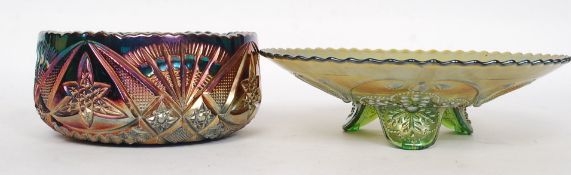 A blue green iridescent carnival glass bowl together with another piece of carnival glass - tazza